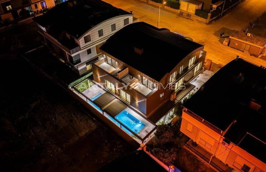 Отдельные дома с садами и бассейнами в Кунду Анталии