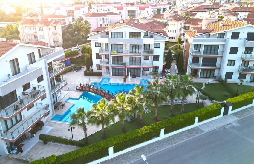 Меблированная квартира 2+1 с садом в комплексе с бассейном в Белеке 1