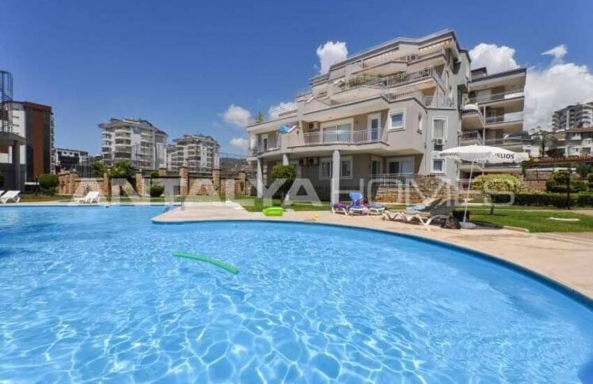 2-комнатная квартира в комплексе рядом с морем в Алании Чиккилли 9