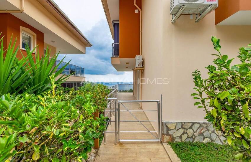 Дуплексная квартира с видом на море, окруженная природой в Алании 5