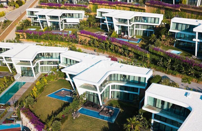 Bodrum Adabükü'nde Özel Koylu Projede Plaja Sıfır Daireler 11