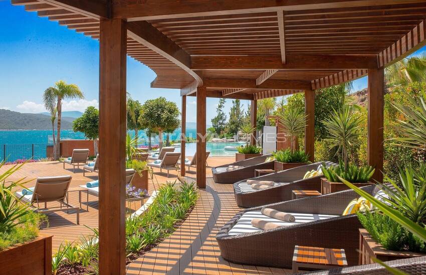 Bodrum Adabükü'nde Özel Koylu Projede Plaja Sıfır Daireler 26