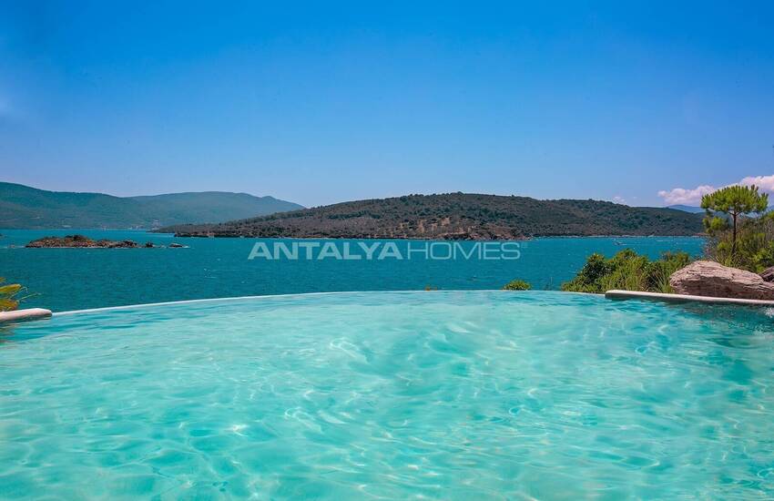 Bodrum Adabükü'nde Özel Koylu Projede Plaja Sıfır Daireler 27