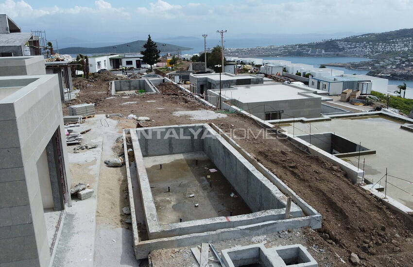 فيلات مطلة على الحمام سباحة والبحر في المدينة بودروم خليج جوندوغان 11