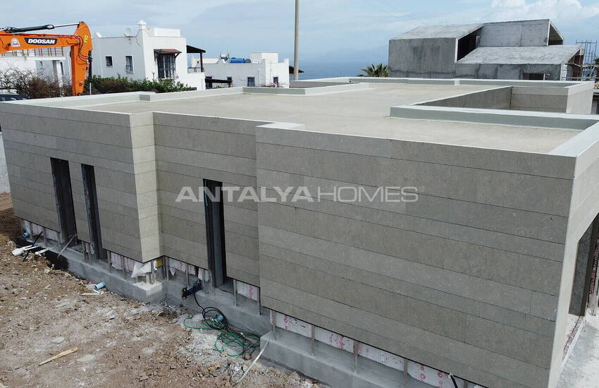 فيلات مطلة على الحمام سباحة والبحر في المدينة بودروم خليج جوندوغان 9