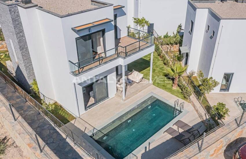 منازل منفصلة مطلة على البحر مع حمام سباحة خاص في بودروم تركيا 1