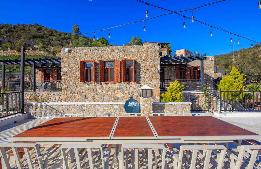 загородный дом на участке площадью 1 091 м² в Каякёй, Фетхие 11