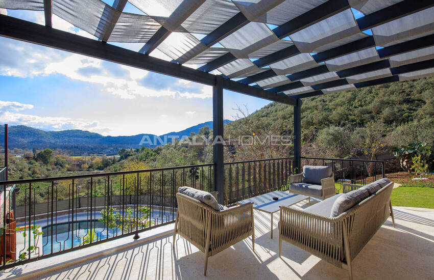 загородный дом на участке площадью 1 091 м² в Каякёй, Фетхие 12