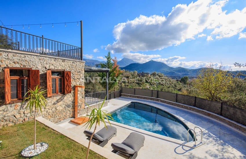 загородный дом на участке площадью 1 091 м² в Каякёй, Фетхие 3