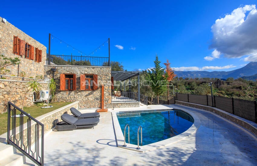 загородный дом на участке площадью 1 091 м² в Каякёй, Фетхие 4