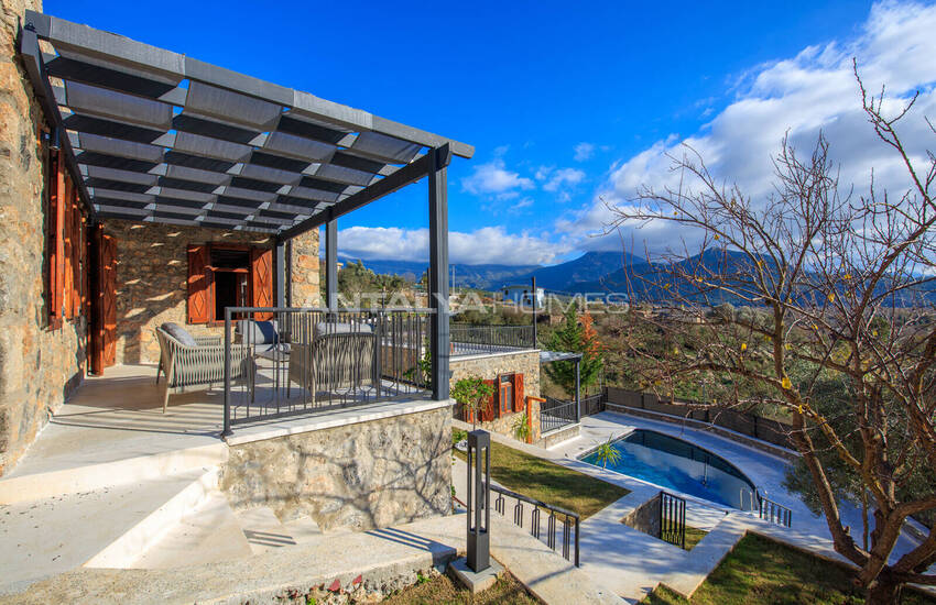 загородный дом на участке площадью 1 091 м² в Каякёй, Фетхие 5