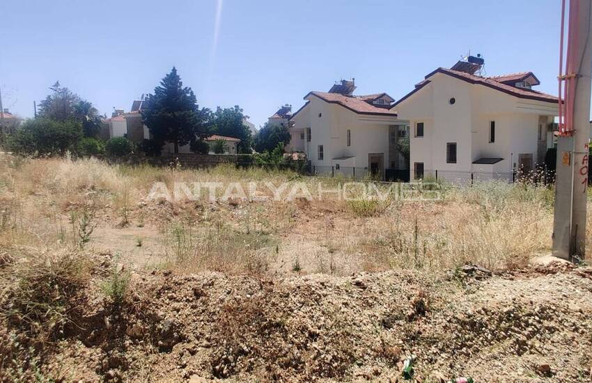 Зонированная земля с частичным видом на море в Фетхие Олюдениз 9