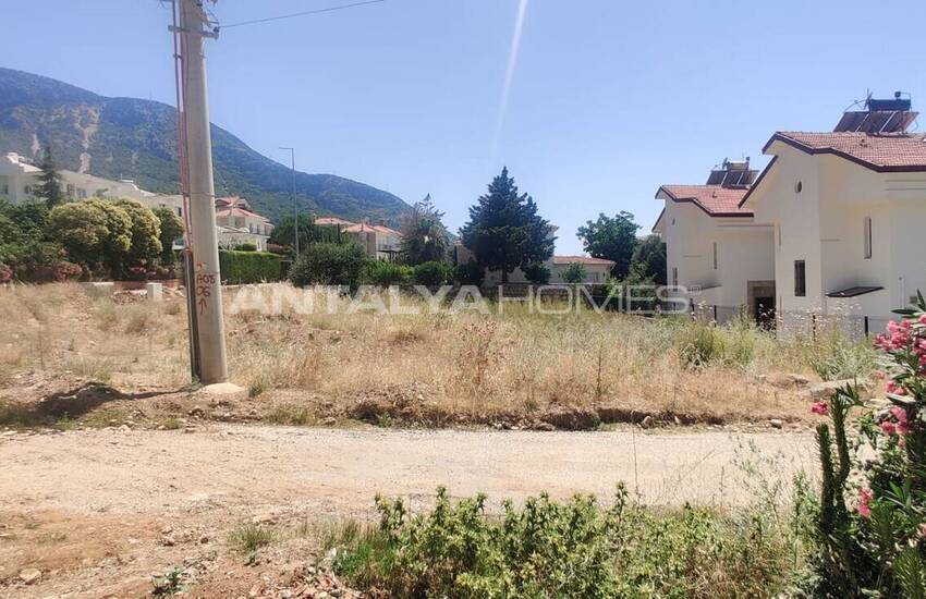 Зонированная земля с частичным видом на море в Фетхие Олюдениз 11