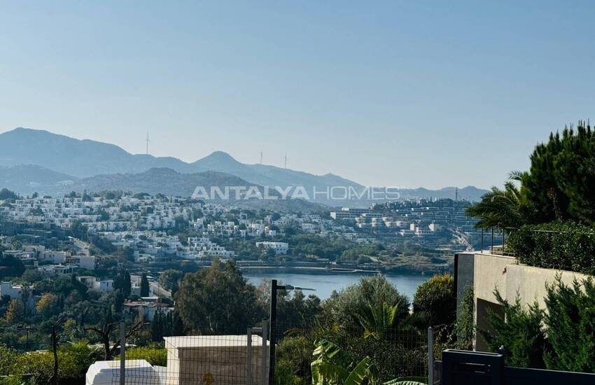 Отдельно стоящий дом с бассейном в закрытом комплексе в Ялыкаваке 1