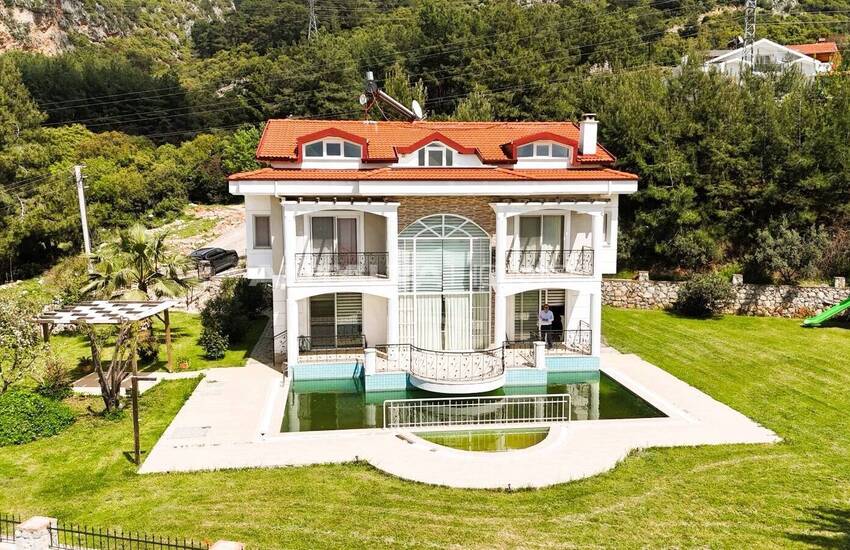 منزل على قطعة أرض مساحتها 1500 متر مربع في فتحية أولودينيز 15