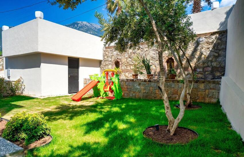 Виллы с частными бассейнами в 10 минутах от пляжа в Фетхие 6