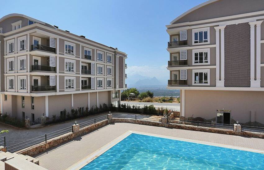 آپارتمان با چشم انداز عالی کوه در منطقه در حال توسعه آنتالیا 1