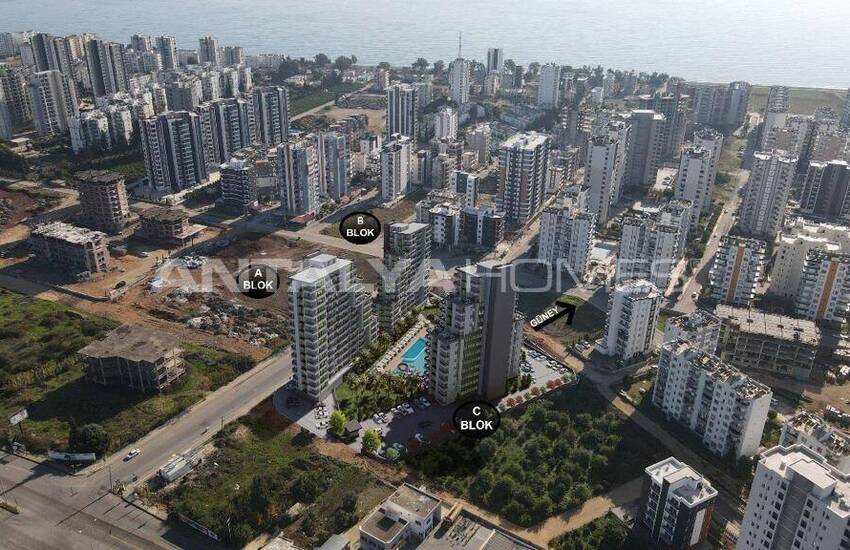 شقق جديدة وأنيقة مطلة على البحر والمدينة للبيع في مرسين تيجي 11