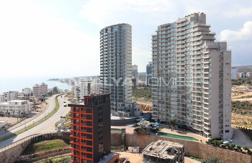 Новые квартиры рядом с морем в Мерсин Аяс 6