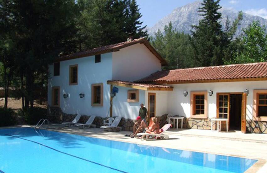 Detached Kemer Houses Intertwined with Nature in Calm Region