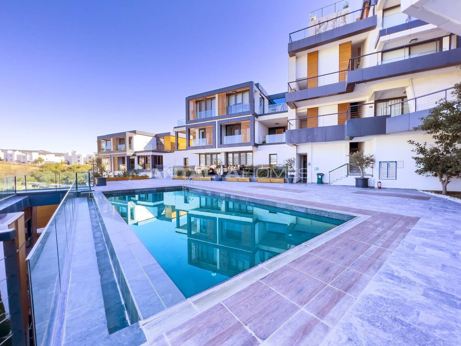 View of Apartments in a Luxury Complex with Pool in Bodrum Gumbet