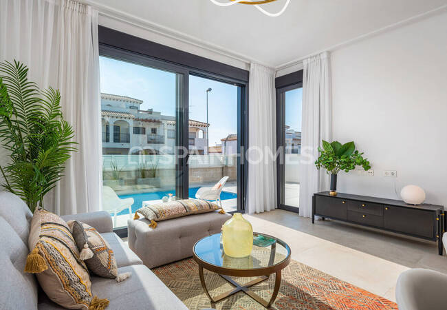 Современные Отдельные Виллы в Ориуэле с Бассейном и Солярием 18