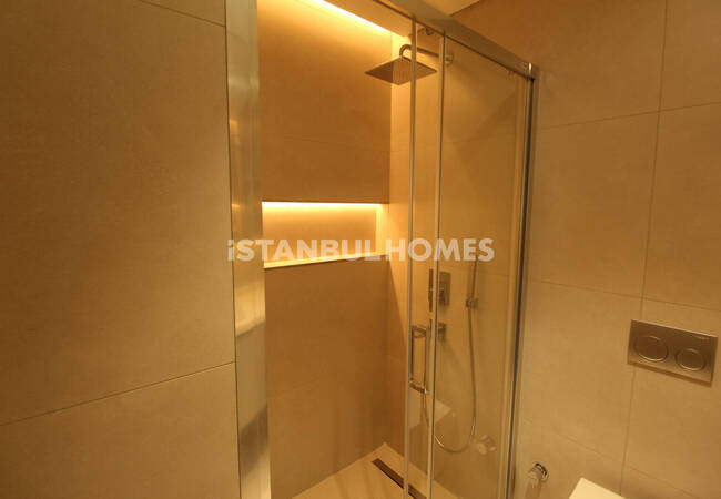 伊斯坦布尔巴格吉拉尔区带泳池的一居室、两居室和三居室公寓 13