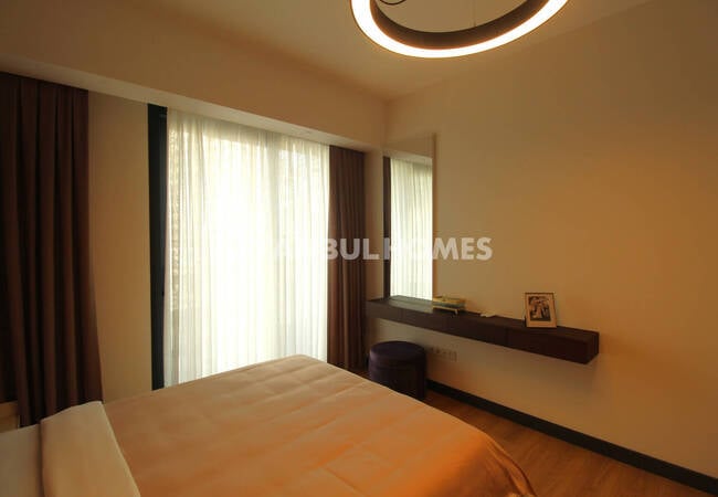 伊斯坦布尔巴格吉拉尔区带泳池的一居室、两居室和三居室公寓 11