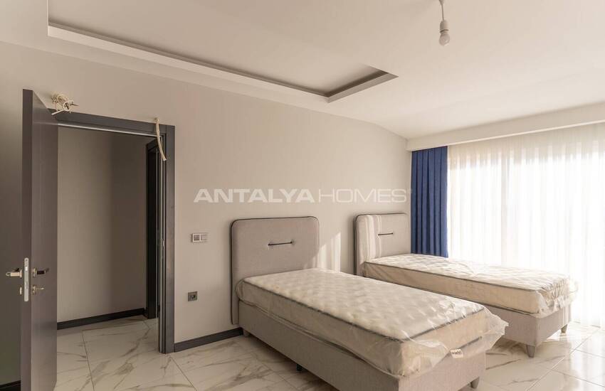 Квартиры в 300 м от моря в центре Махмутлара в Алании 34