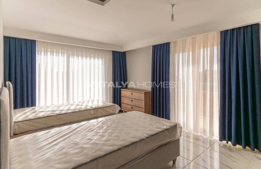 Квартиры в 300 м от моря в центре Махмутлара в Алании 35