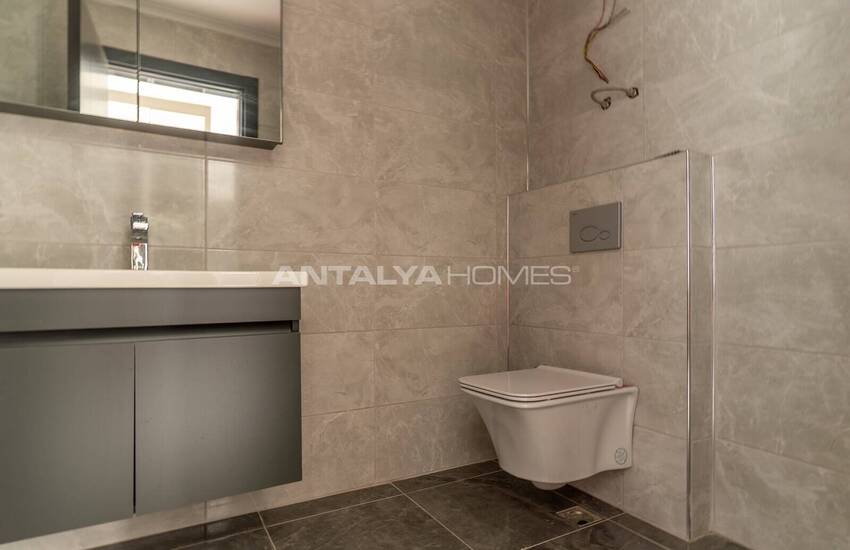 Квартиры в 300 м от моря в центре Махмутлара в Алании 26