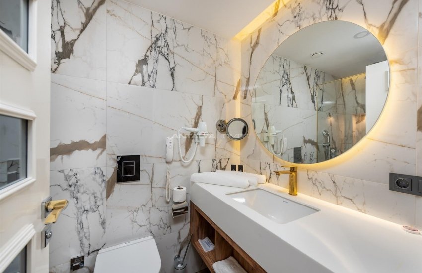 عقارات فاخرة للبيع بمفهوم فندق 5 نجوم في كوناكلي 40