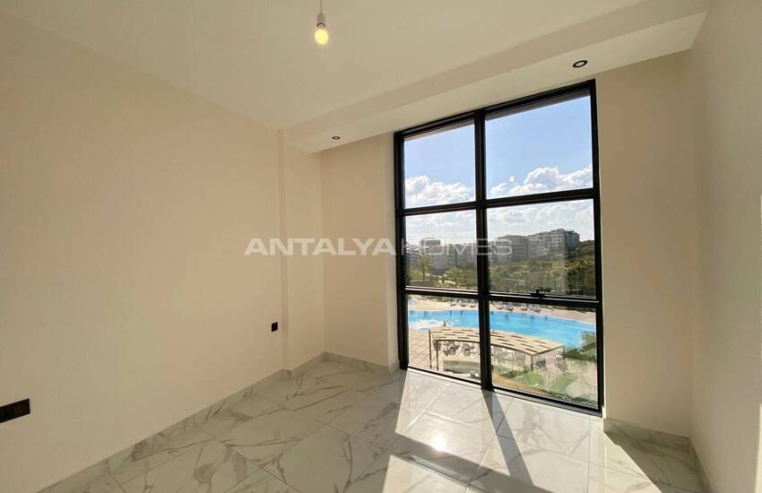 Alanya Kestel'de Havuzlu ve Güvenlikli Sitede Daireler 19