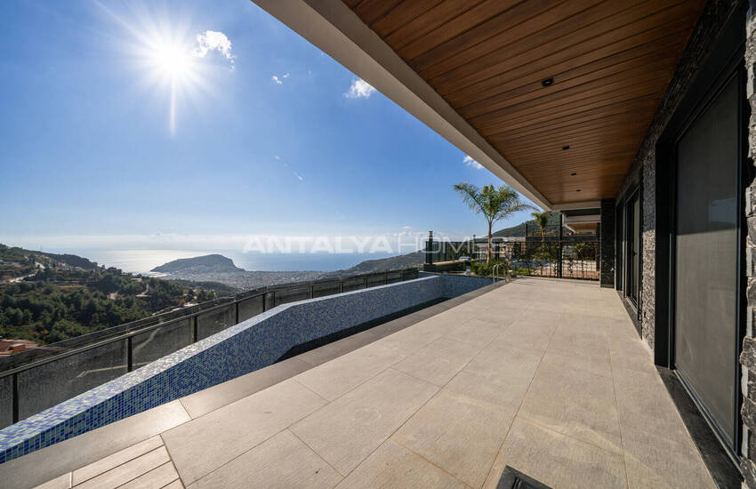 فلل فاخرة مع حديقة خاصة و إطلالة على البحر في ألانيا 24