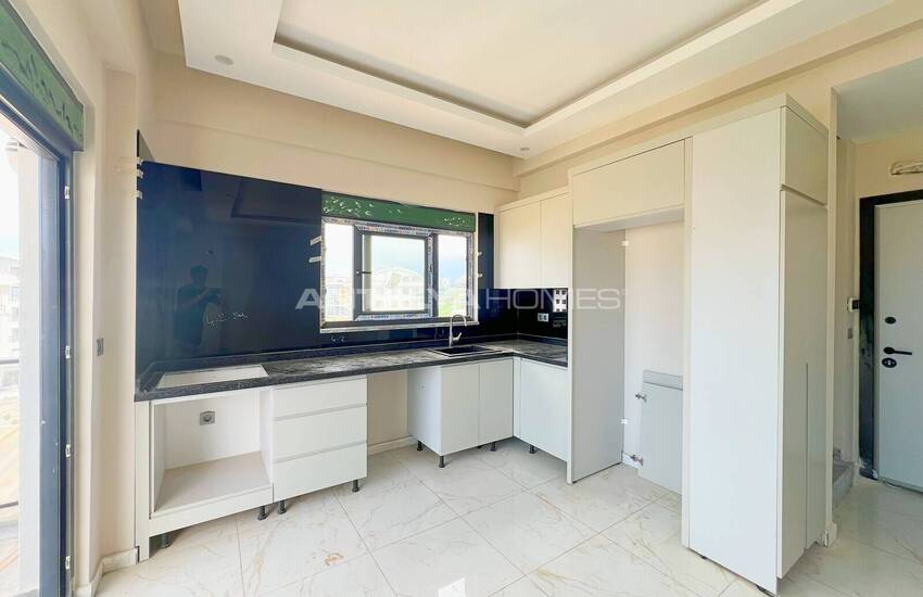 عقارات جديدة بالقرب من الشاطئ في ألانيا كارجيجاك 11