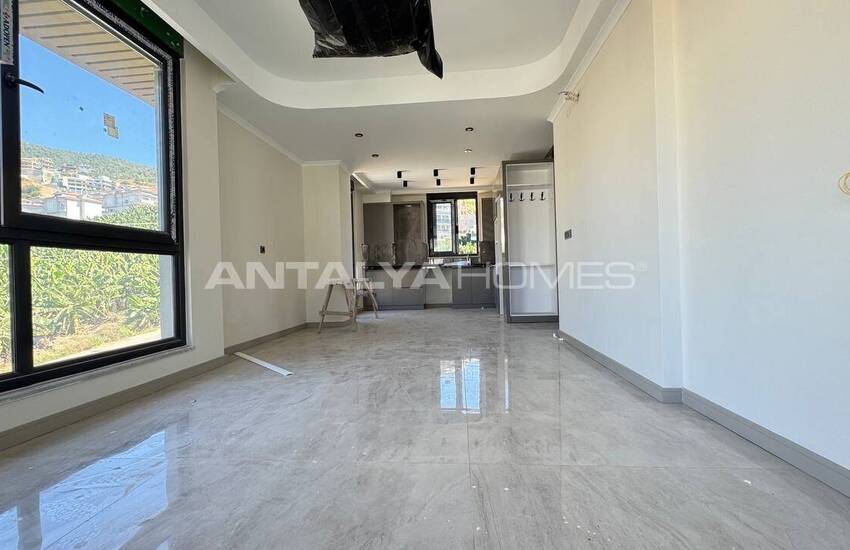 آپارتمان در یک مجتمع در نزدیکی امکانات رفاهی در آلانیا ترکیه 11