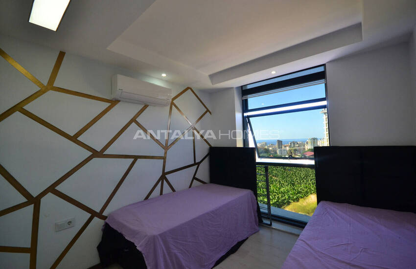 آپارتمان با دید دریا در مجتمعی در محمودلار آلانیا 33