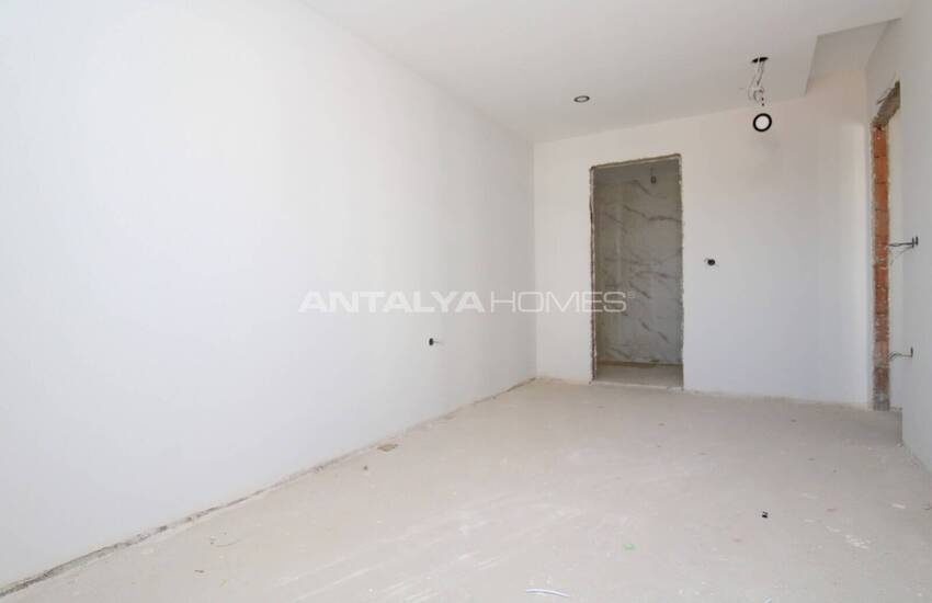 آپارتمان در یک مجتمع با پارکینگ سرپوشیده در آنتالیا آلتینتاش 12