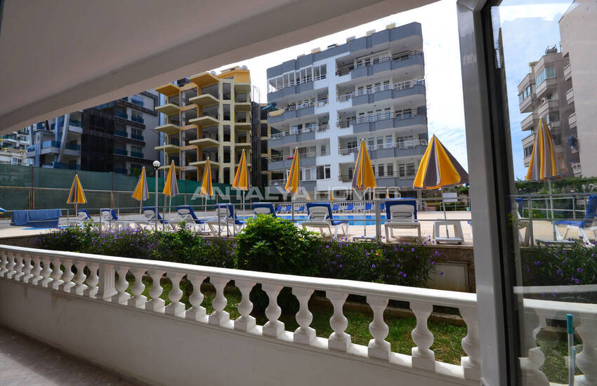 Alanya Mahmutlar'da Denize Sıfır Havuz Manzaralı Eşyalı Daire 35