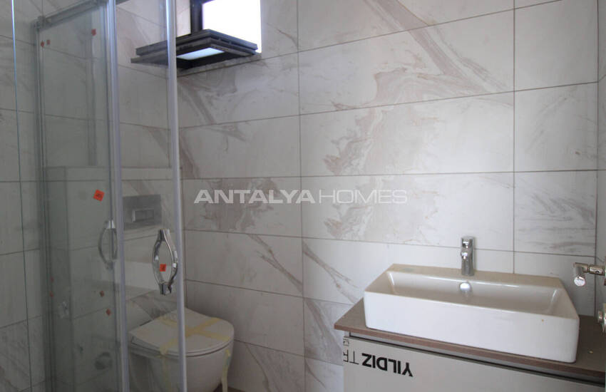 Spacious Flats in a Project with Pool in Altıntaş Antalya 32