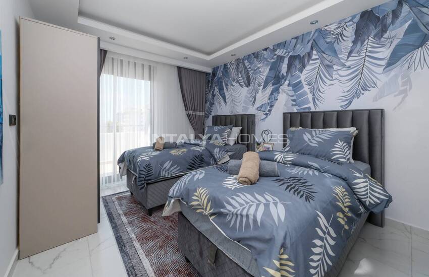 Alanya'da Havuzlu Sitede Eşyalı Deniz Manzaralı Daireler 25