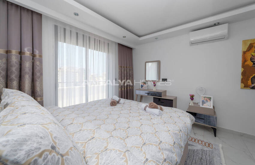 Alanya'da Havuzlu Sitede Eşyalı Deniz Manzaralı Daireler 19