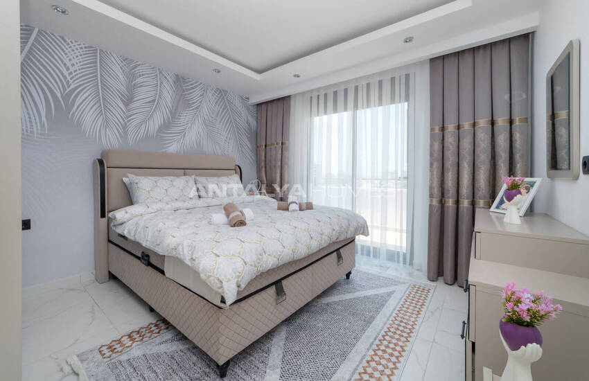 Alanya'da Havuzlu Sitede Eşyalı Deniz Manzaralı Daireler 17