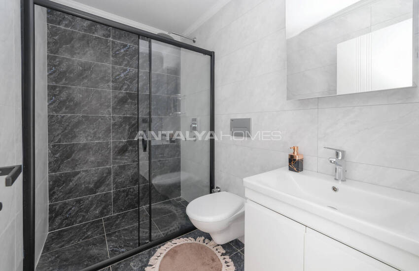 Alanya'da Havuzlu Sitede Eşyalı Deniz Manzaralı Daireler 13