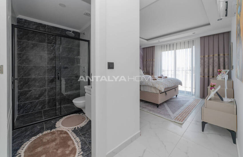 Alanya'da Havuzlu Sitede Eşyalı Deniz Manzaralı Daireler 16