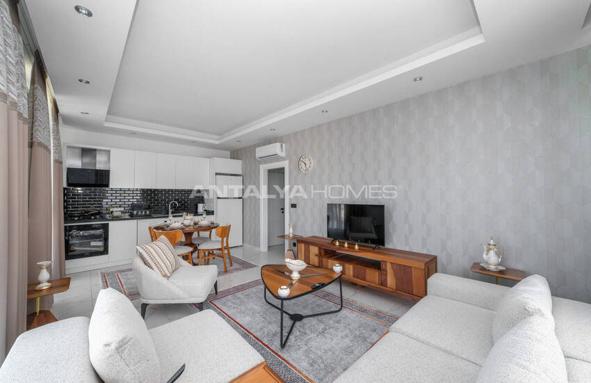 Alanya'da Havuzlu Sitede Eşyalı Deniz Manzaralı Daireler 8