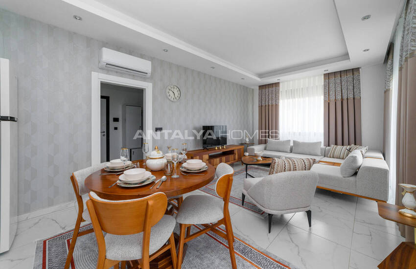 Alanya'da Havuzlu Sitede Eşyalı Deniz Manzaralı Daireler 11