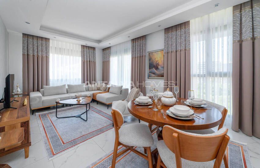 Alanya'da Havuzlu Sitede Eşyalı Deniz Manzaralı Daireler 9