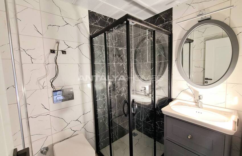 Alanya'da Zengin Olanaklı Sitede Şehir ve Dağ Manzaralı Daireler 27