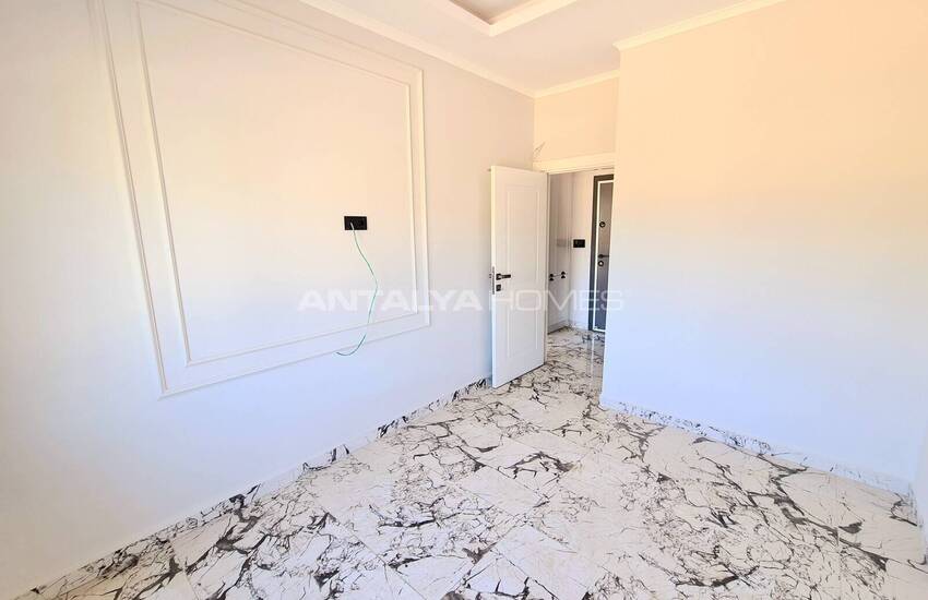 Alanya'da Zengin Olanaklı Sitede Şehir ve Dağ Manzaralı Daireler 25